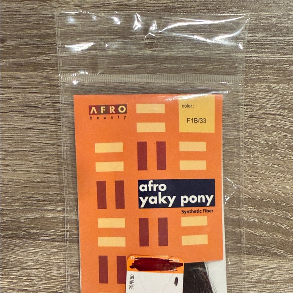 Afro Beauty afro yaky pony synthetic fiber in color F1B/33